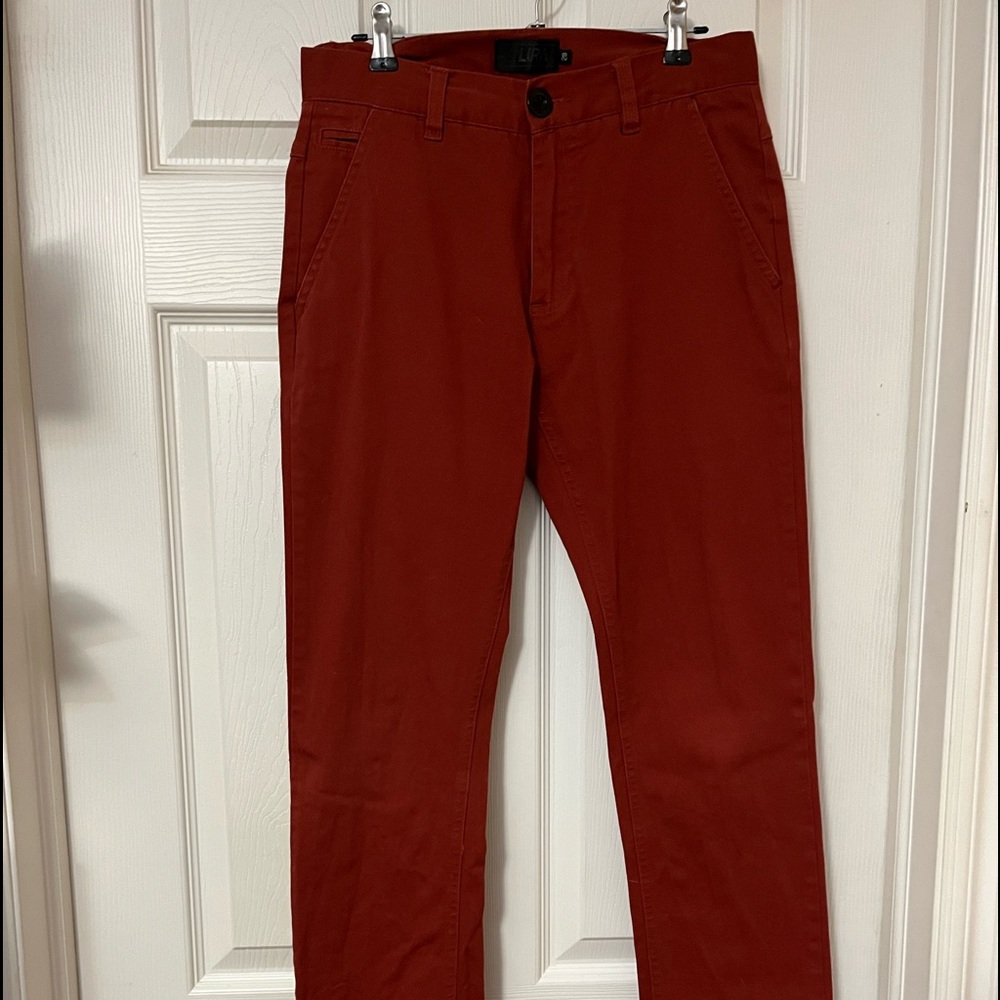 Colour: rust. Brand: Lira. Waist: 28” length: 32”